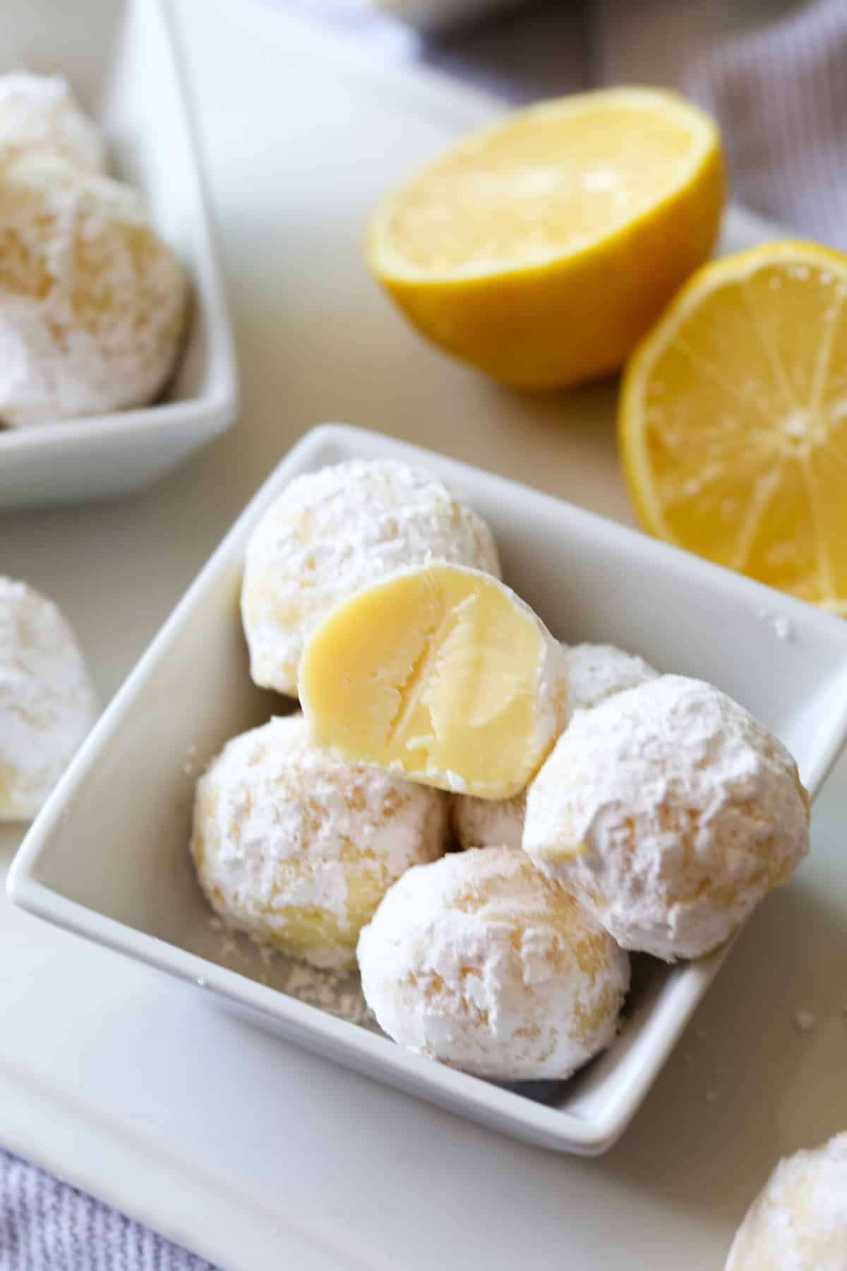 Lemon Truffles in a bowl cut in half