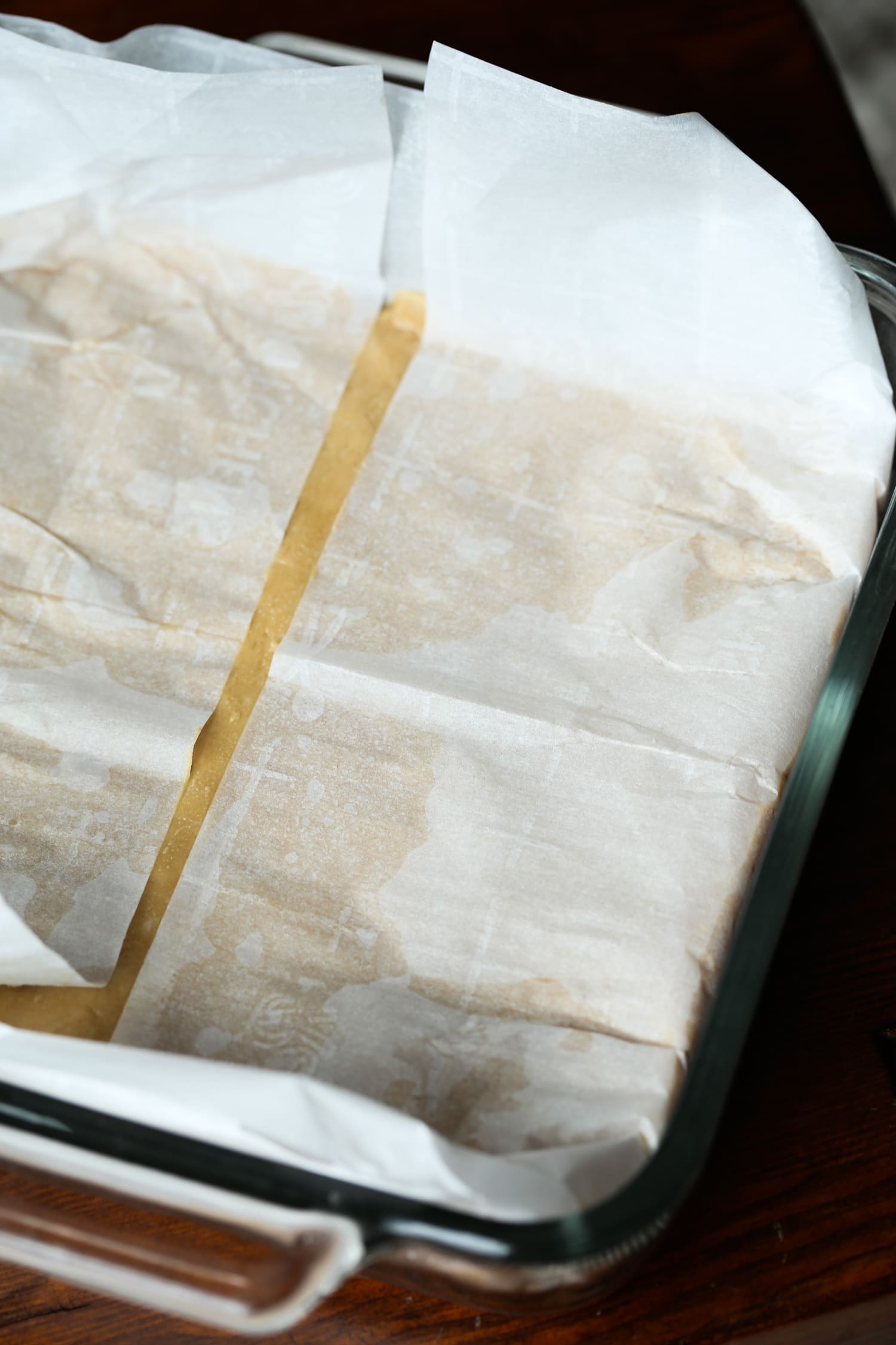 Peanut butter fudge on a parchment-covered mount.