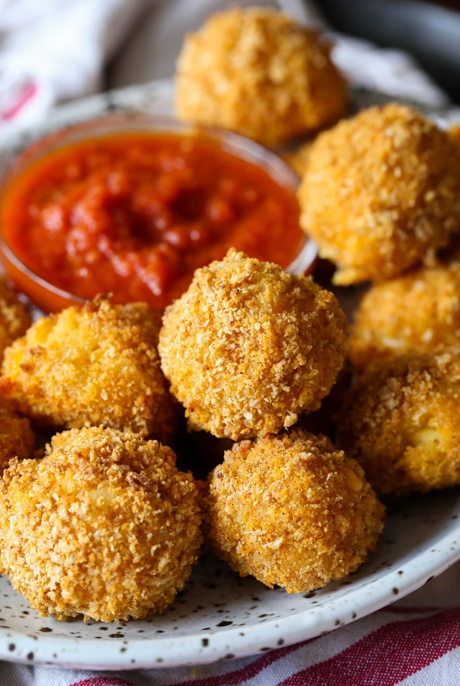 fried mac and cheese balls on a plate