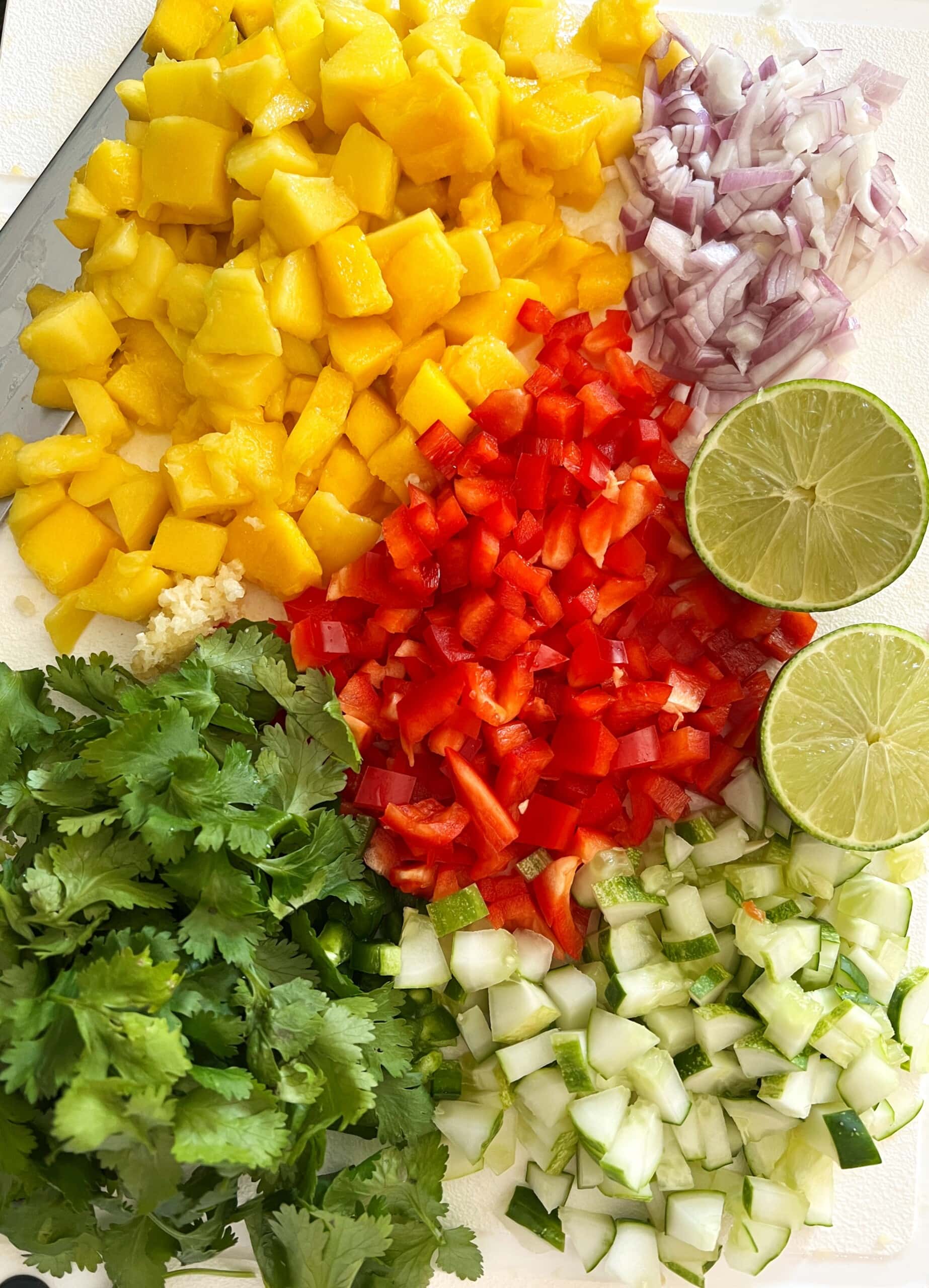 chopped vegetables and fruit for mango salsa