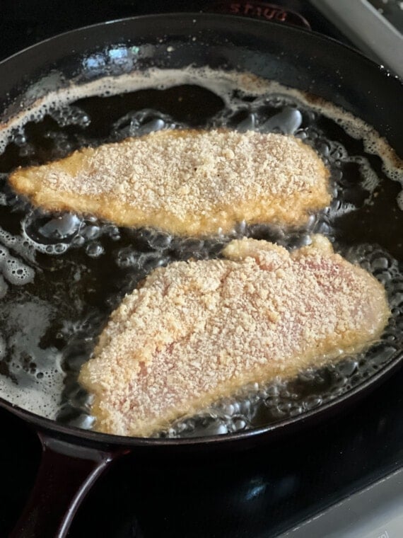 Frying chicken cutlets in a skillet