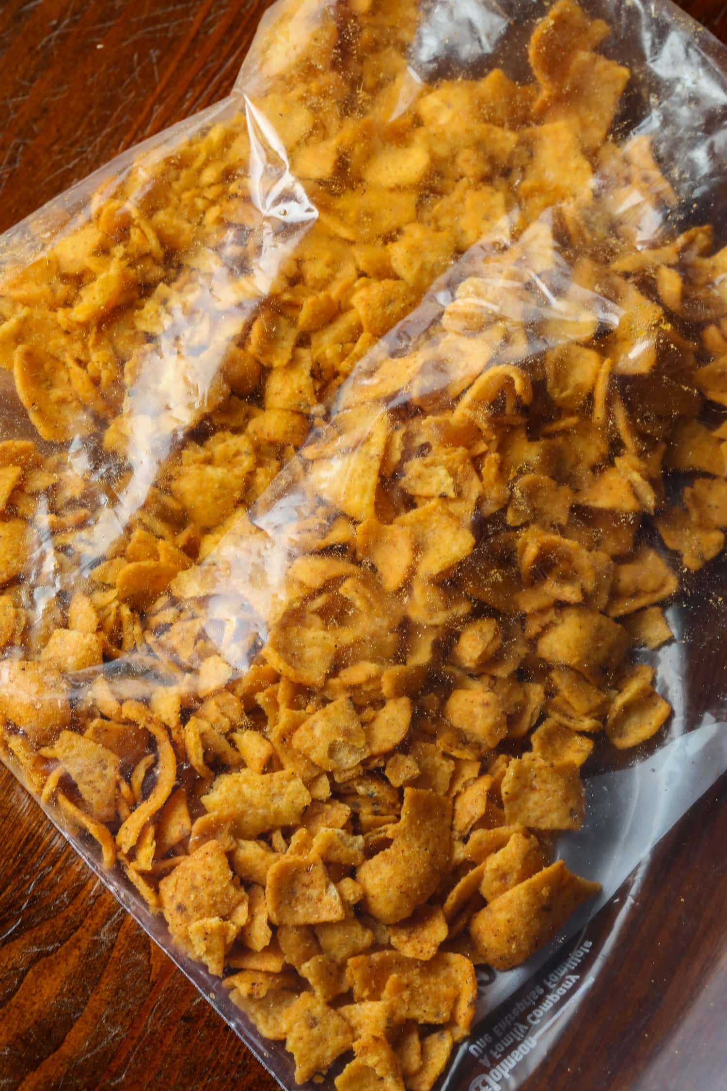 Crushed Fritos inside a gallon ziplock bag.