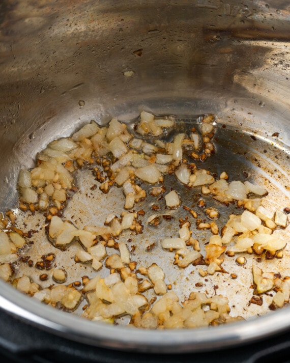 Onions browning in the Instant Pot.