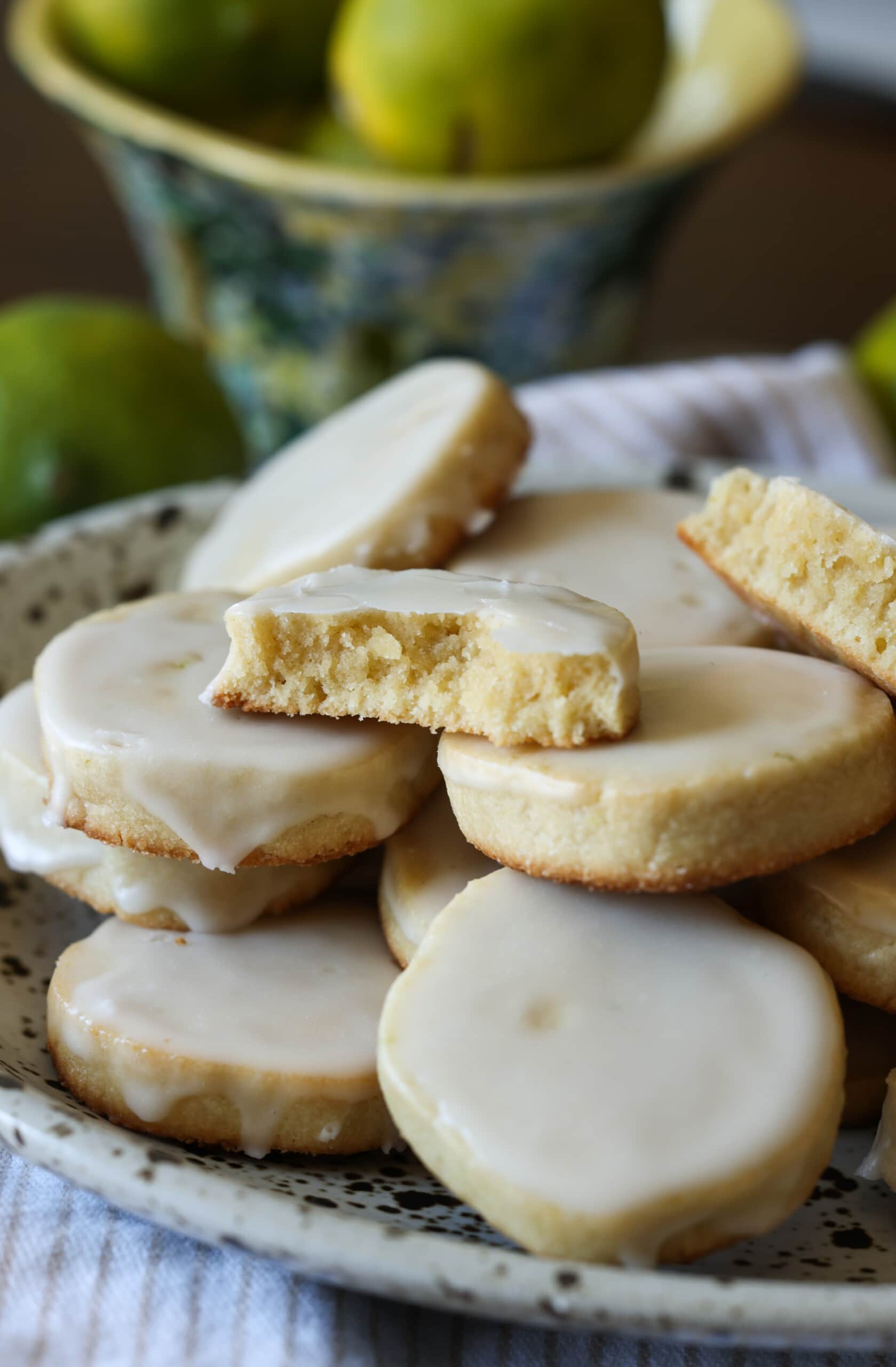 lime shortbread cookie broken in half stacked