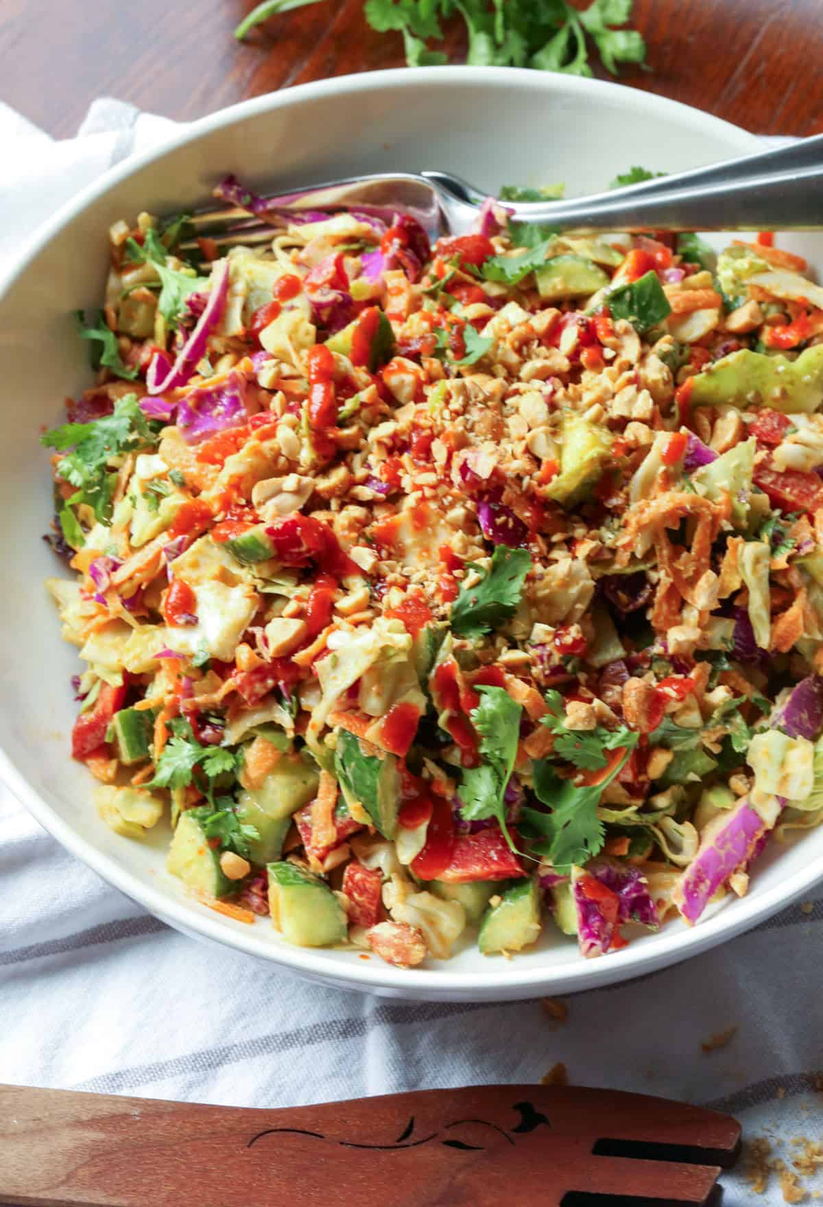 rainbow crunch salad in a white bowl from above