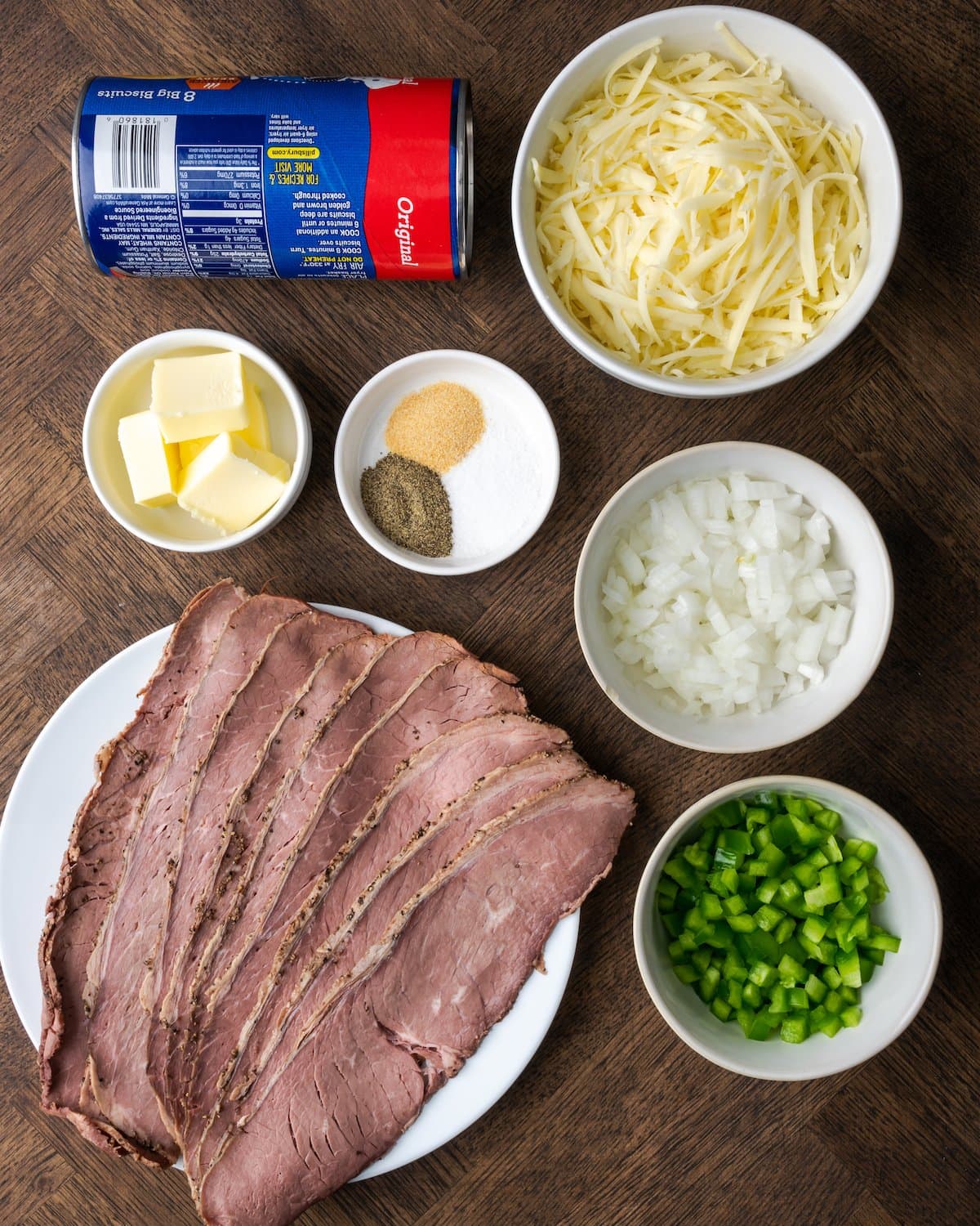 The ingredients for Philly cheesesteak stuffed biscuits.