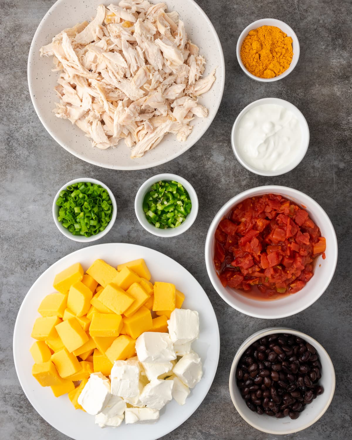 The ingredients for Crock Pot chicken nacho dip.