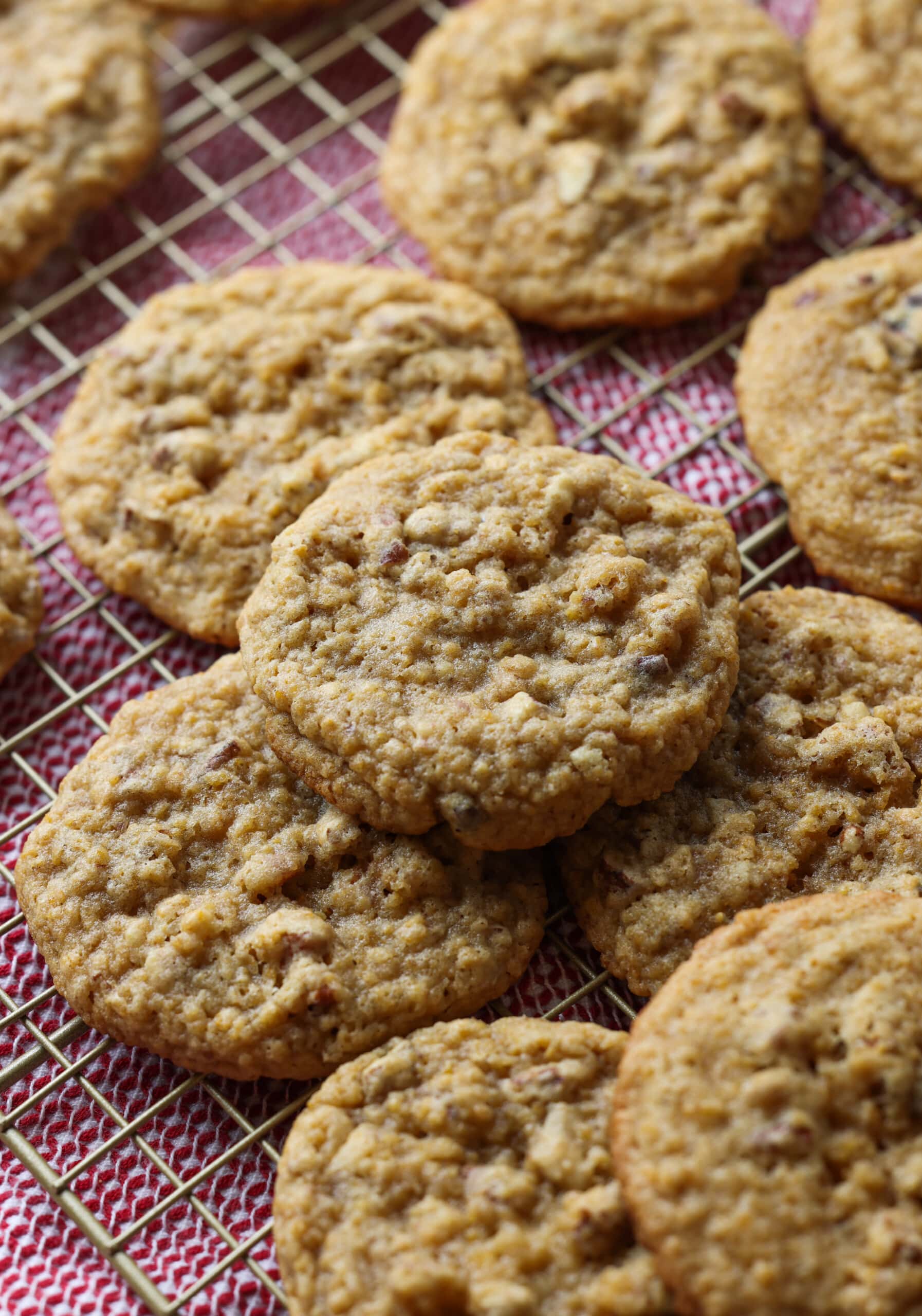 Chewy pecan cookies on a cooling rack