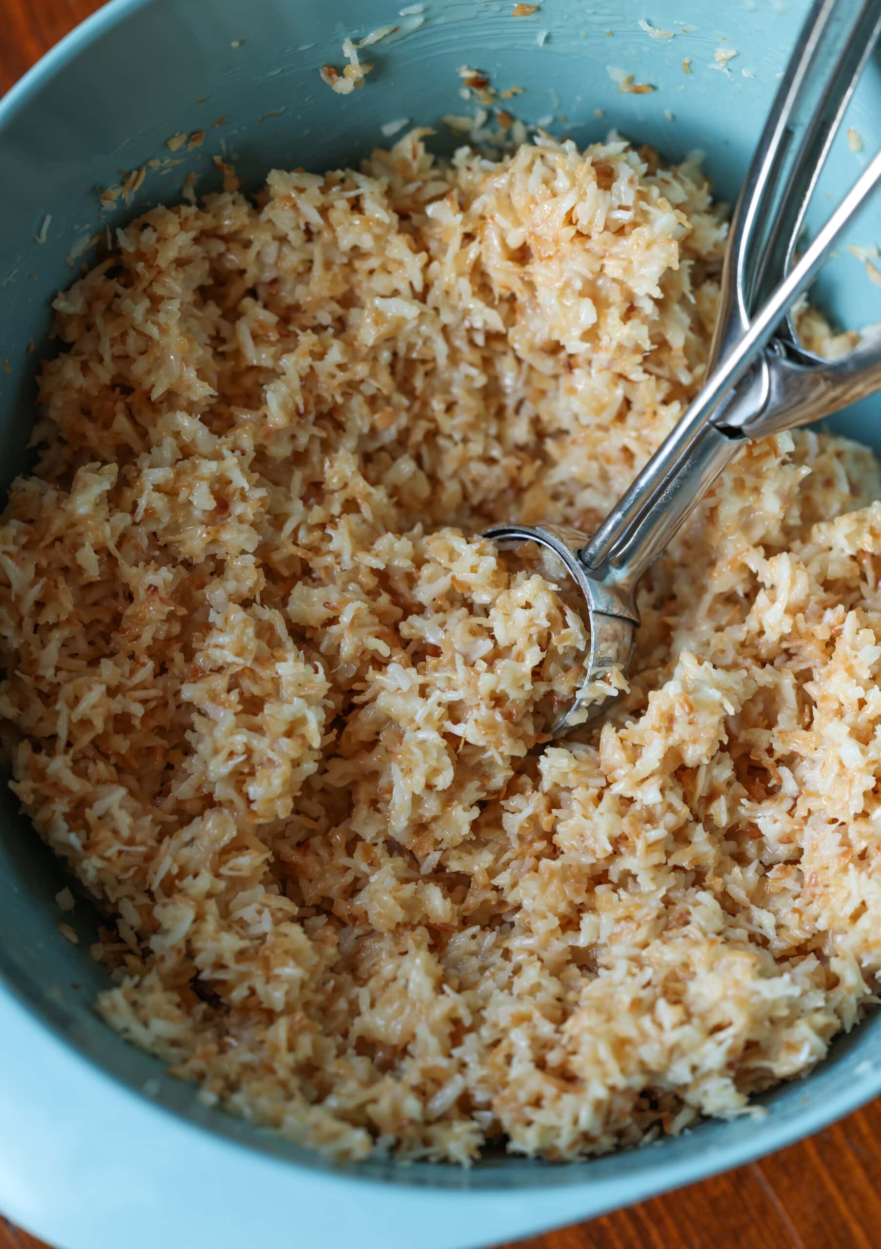 coconut ball mixture with a cookie scoop