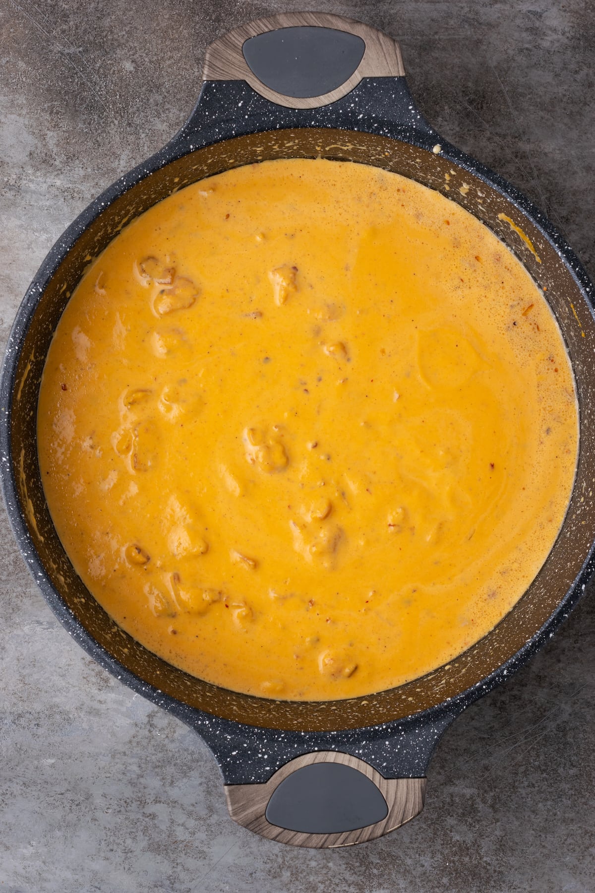 Pumpkin cream sauce in a cast iron skillet.