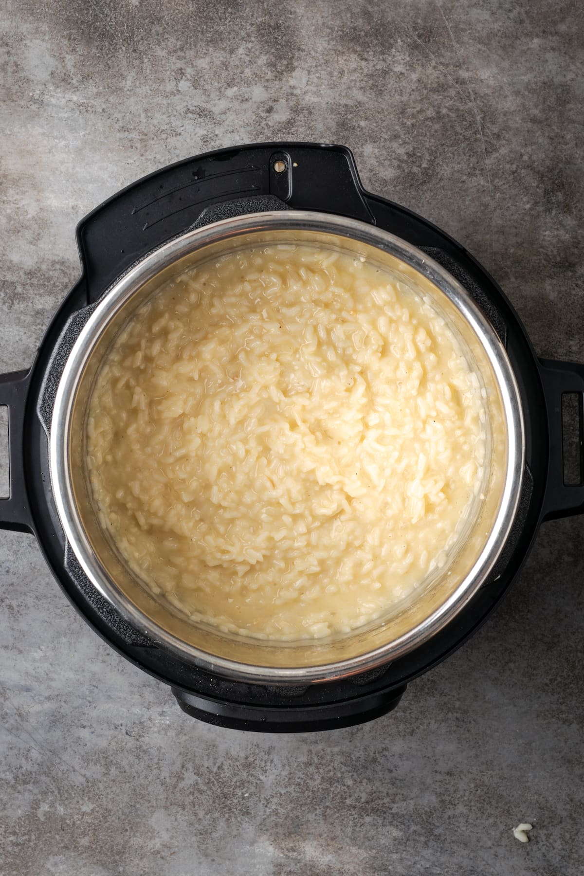 Creamy risotto inside an Instant Pot.