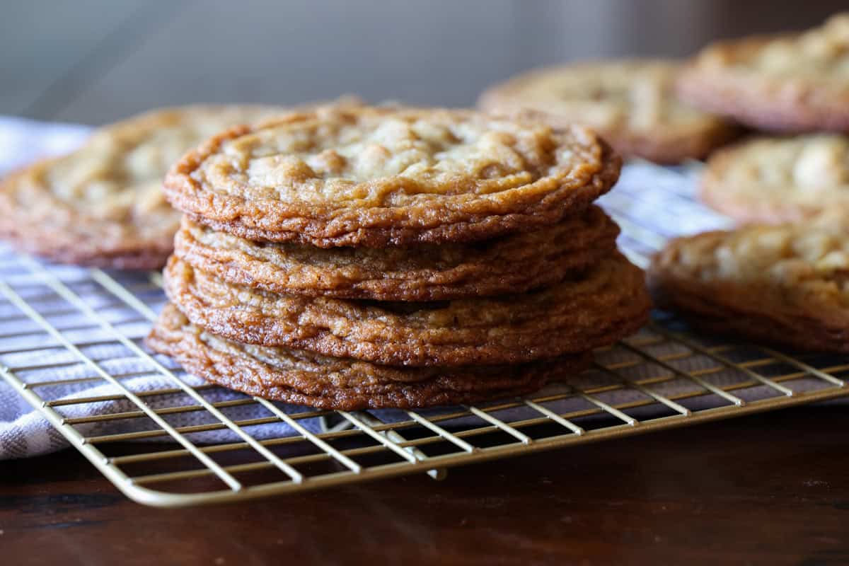stacked walnut cookies with wrinkles edges