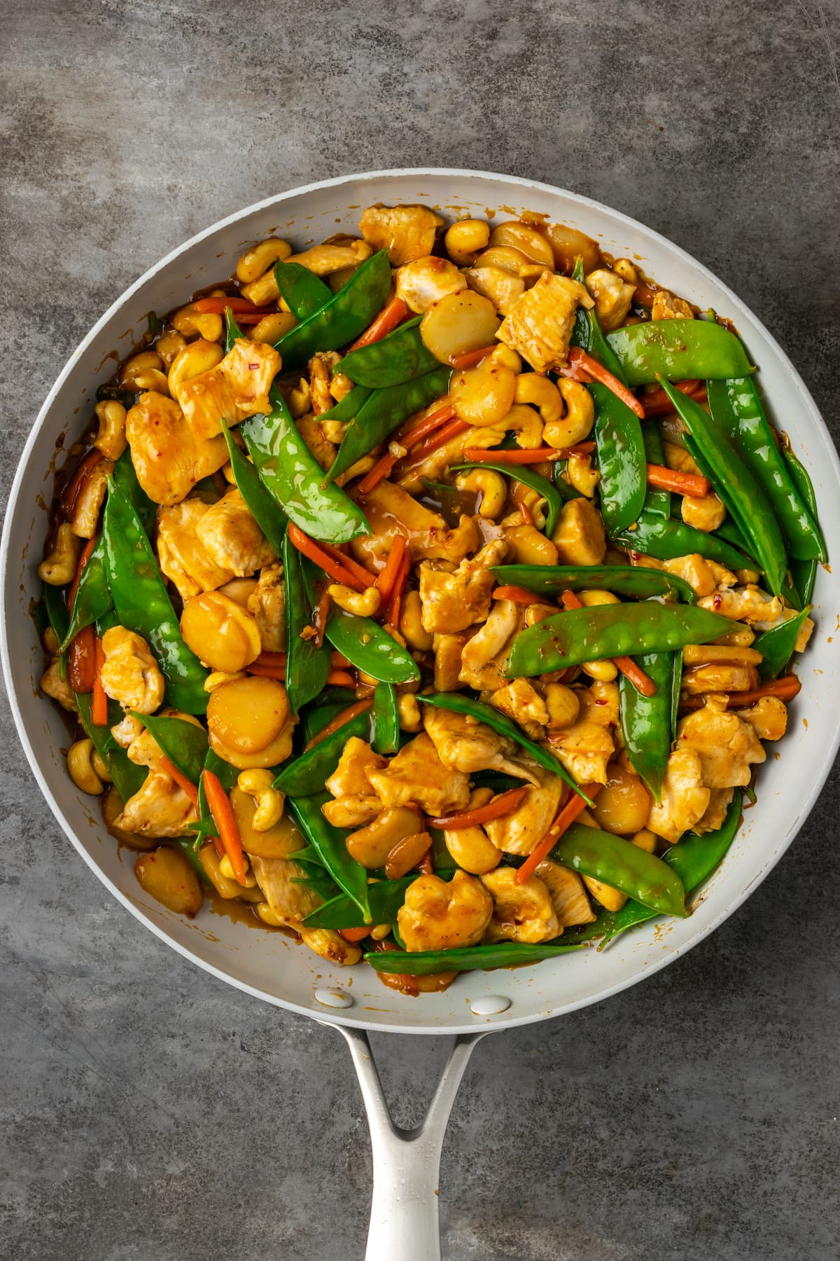 Cashew chicken stir fry in a skillet.