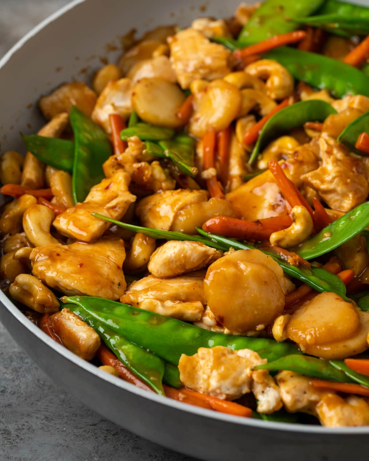 Close up of cashew chicken in a bowl.