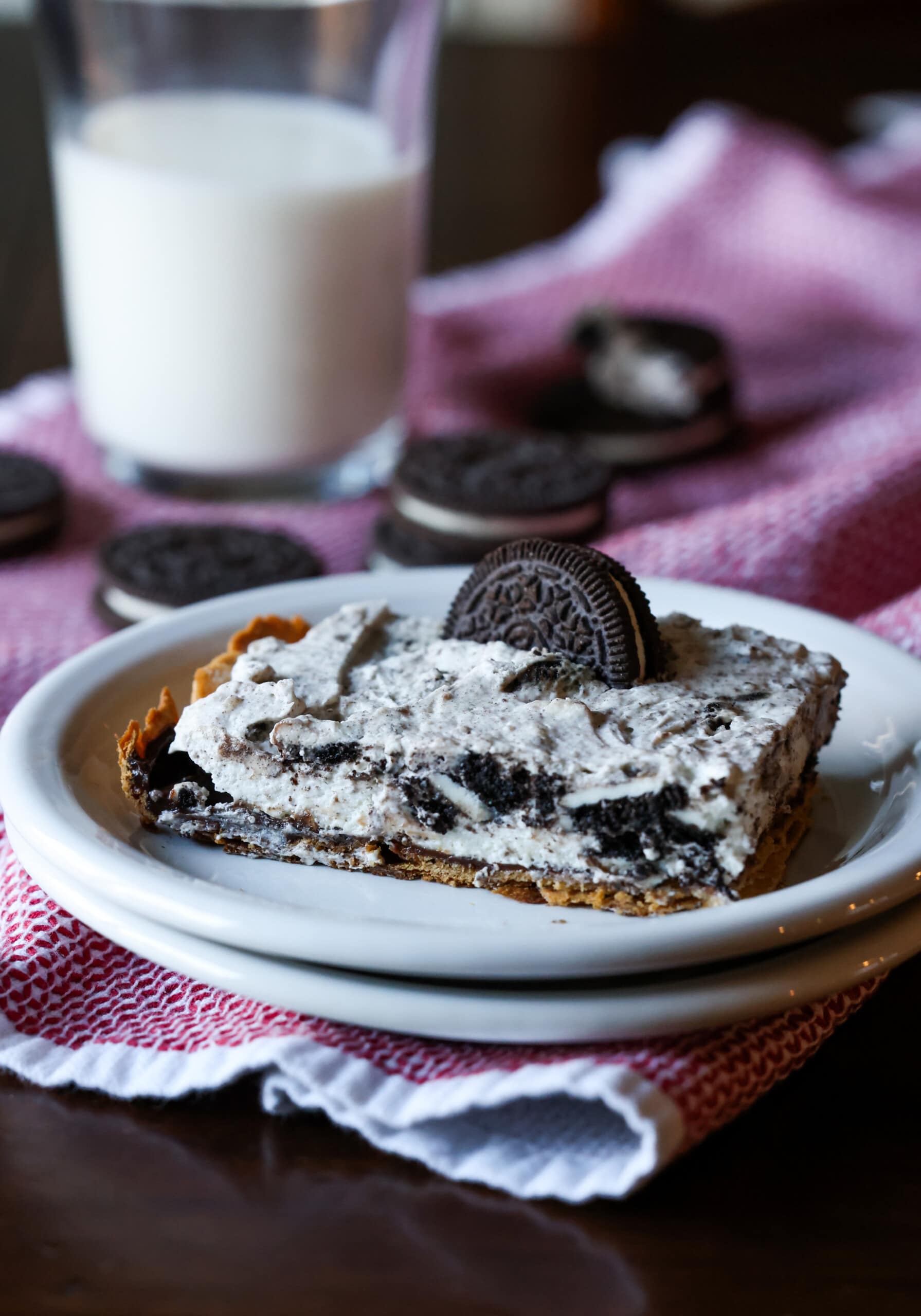 A slice of Oreo cheesecake pie on a plate