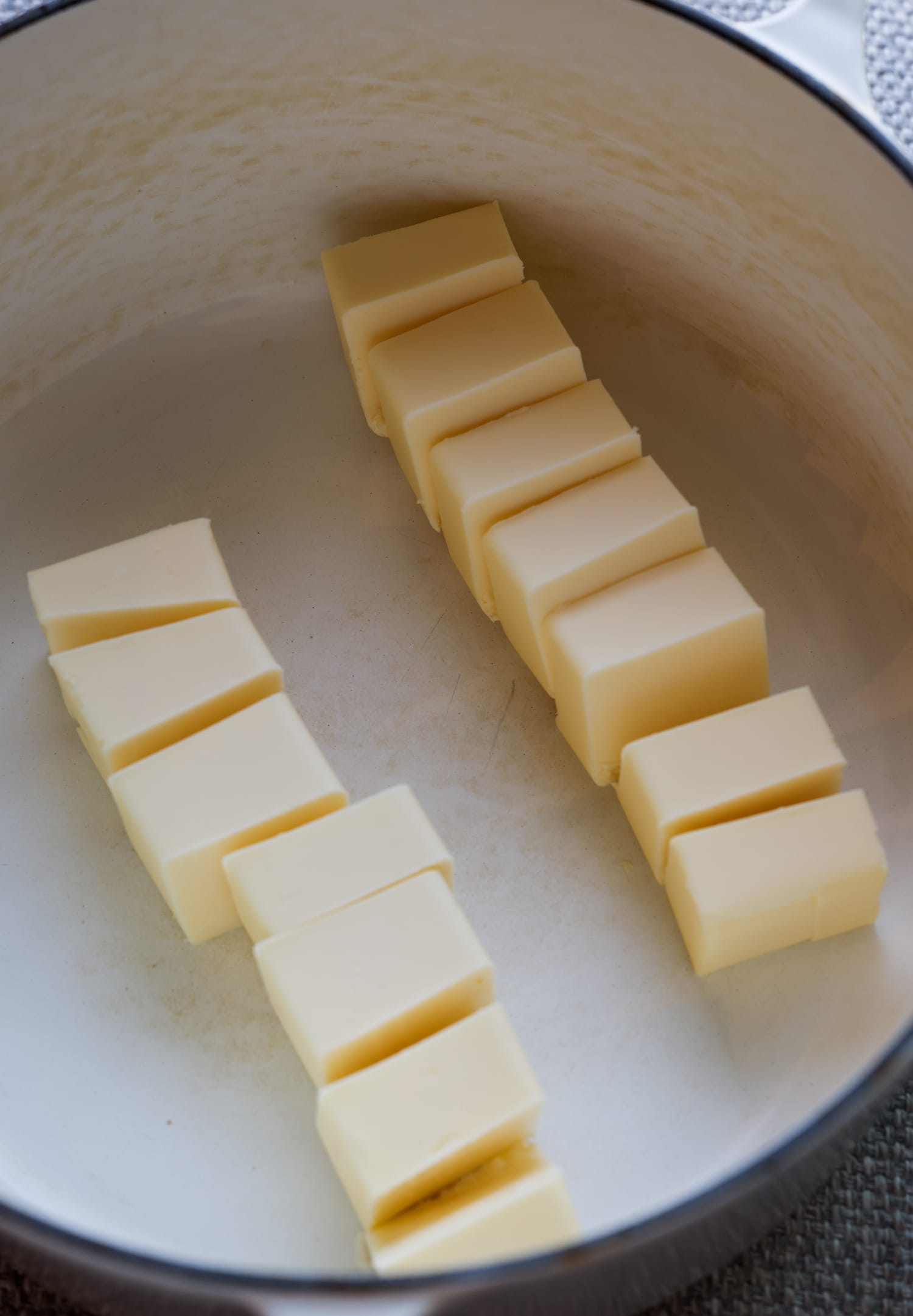 cubed butter in a sauce pot