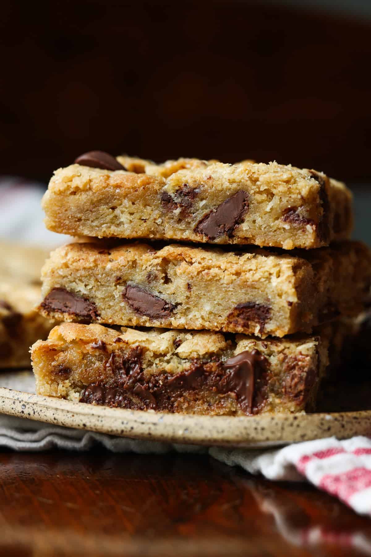 3 stacked blondie cookie bars on a plate