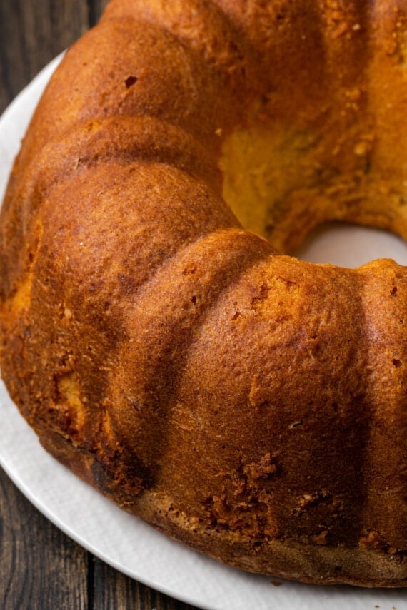 A baked Key lime pound cake on a white plate.