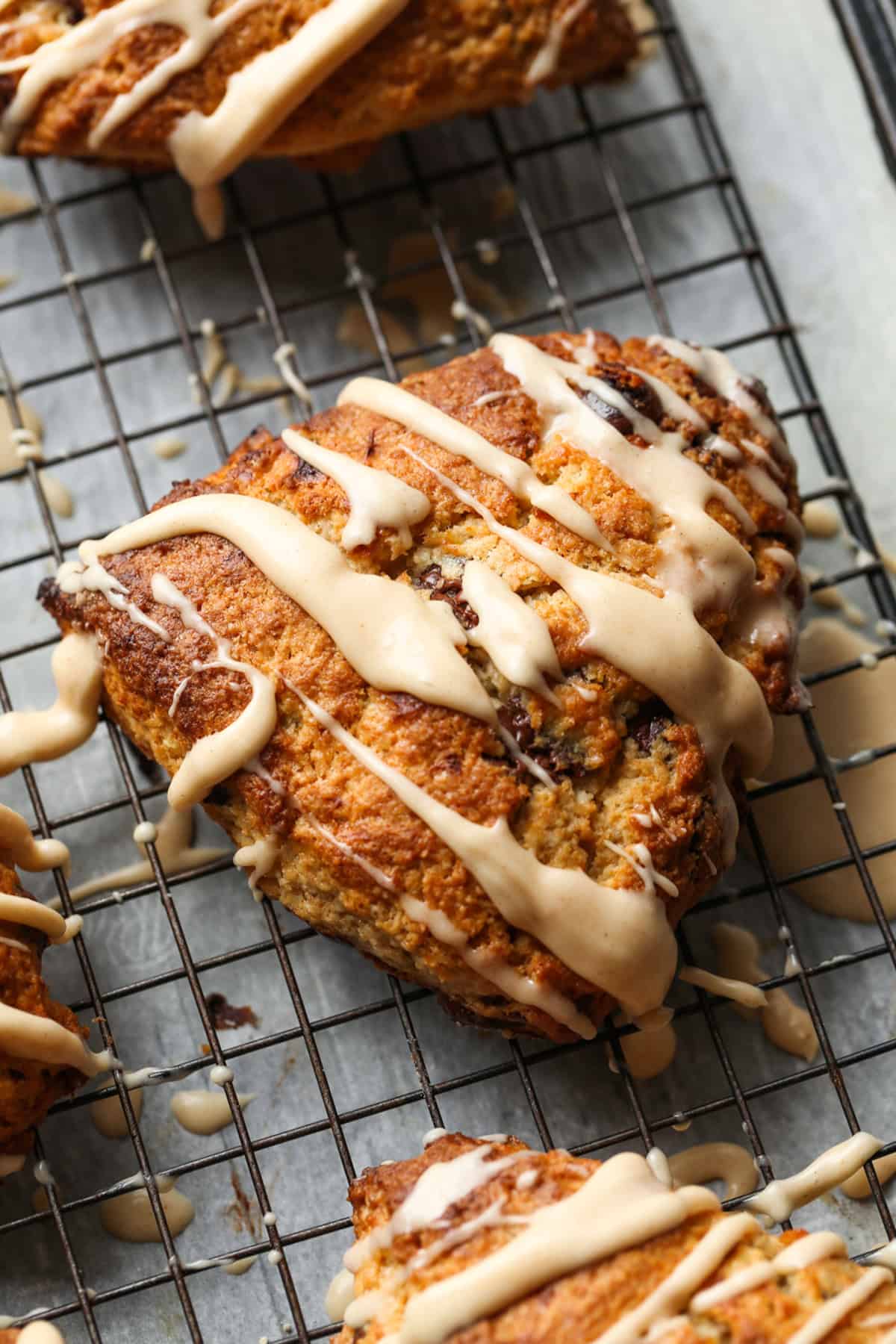 Chocolate Chip Banana Scone with icing drizzled on top