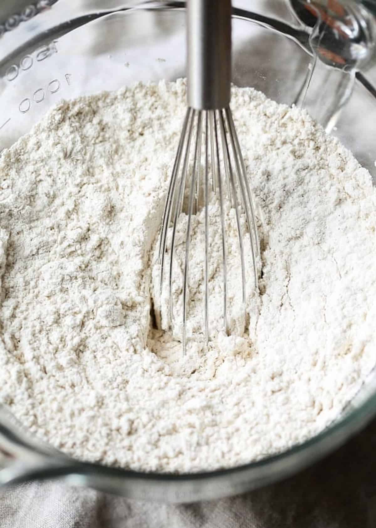 whisked cake flour in a glass bowl