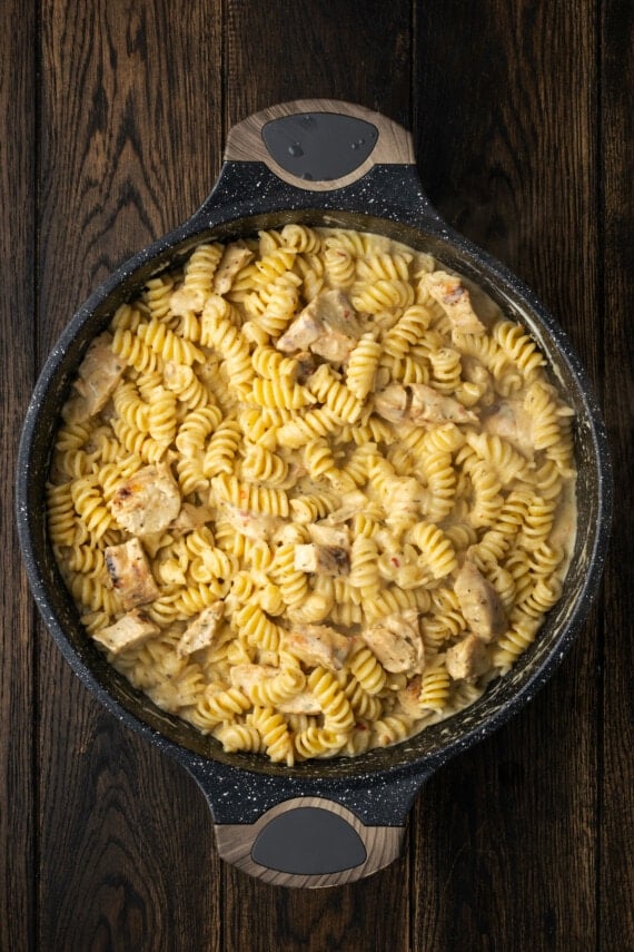 Buffalo Wild Wings garlic parmesan chicken pasta in a skillet.