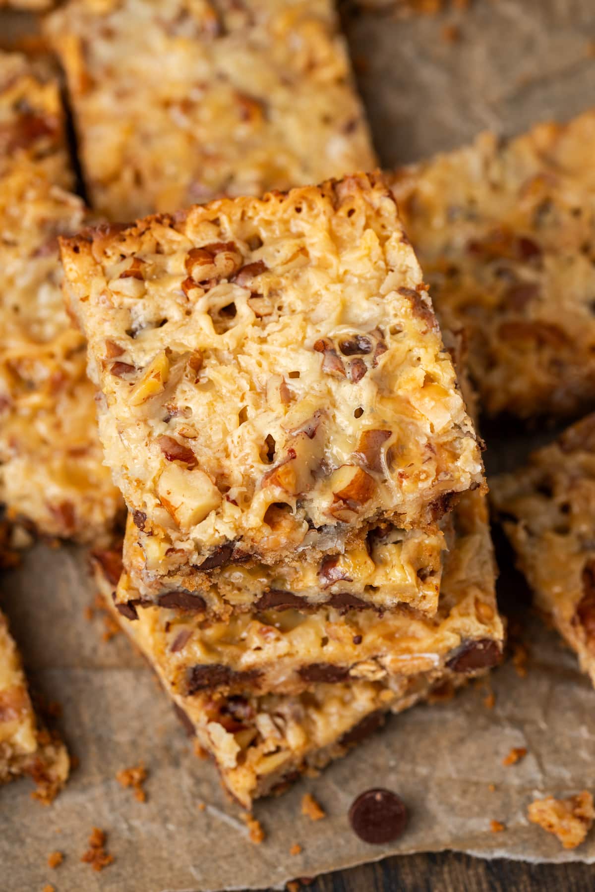 Overhead view of a stack of magic bars surrounded by more bars on a piece of parchment paper.
