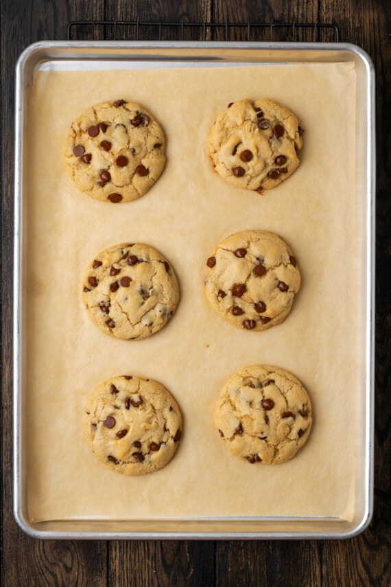 Baked Subway cookies on a parchment-lined baking sheet.