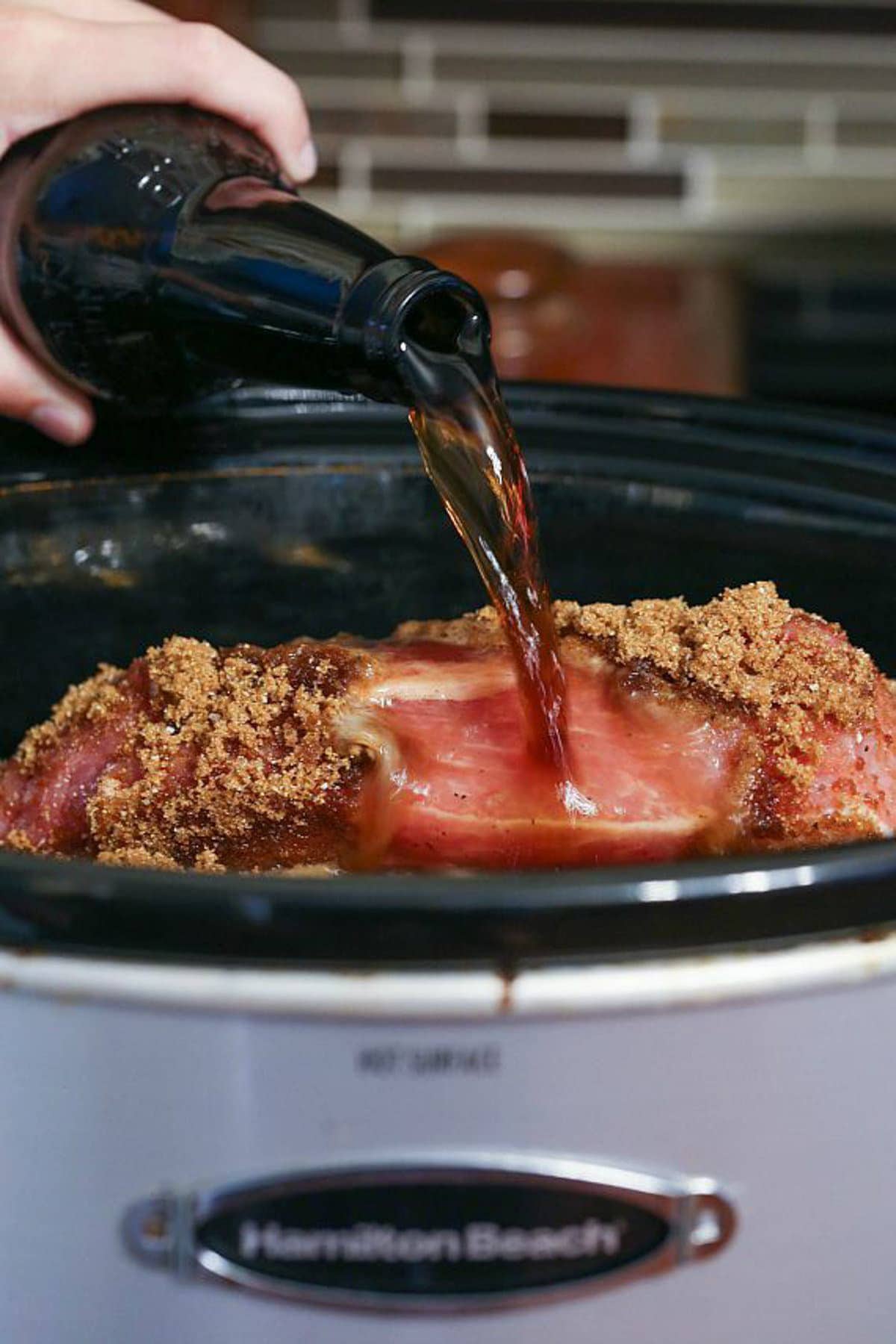 Root beer added to pork in a slow cooker