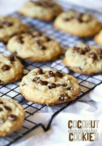 Coconut chocolate chip cookies on a wire cooling rack.