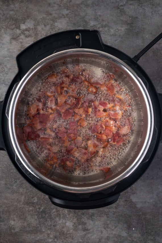 Sauteed bacon inside the instant pot.