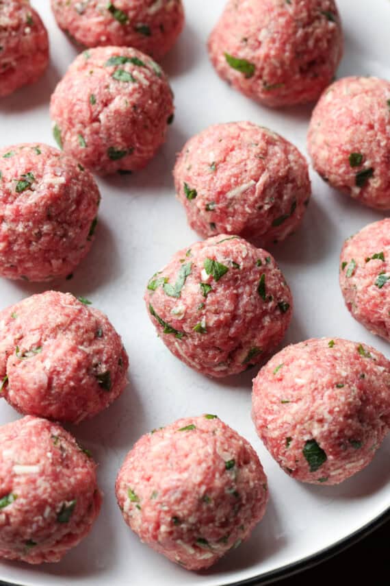 Raw meatballs before going into the oven.