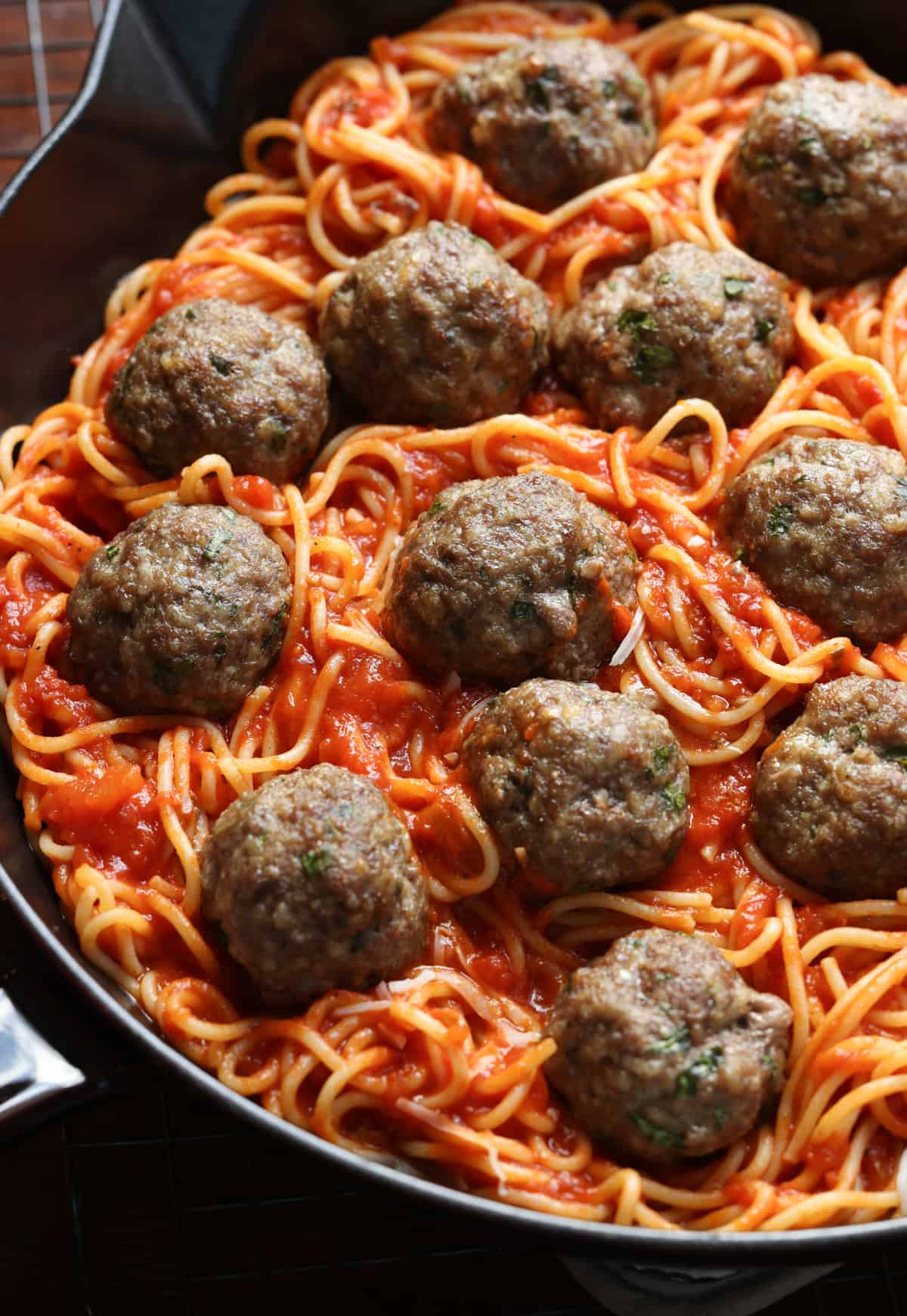 Combine baked spaghetti with sauce and meatballs in a skillet.