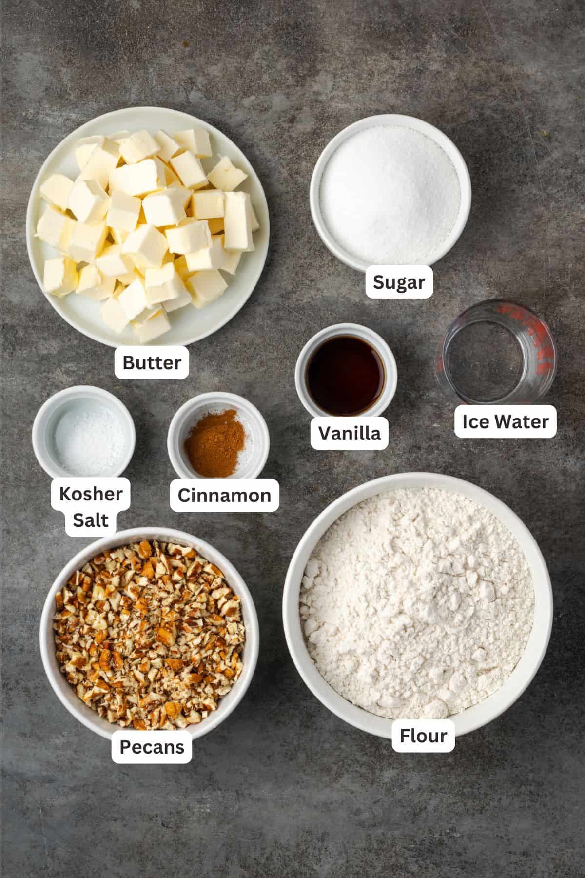 Pecan sandies ingredients with text labels overlaying each ingredient.