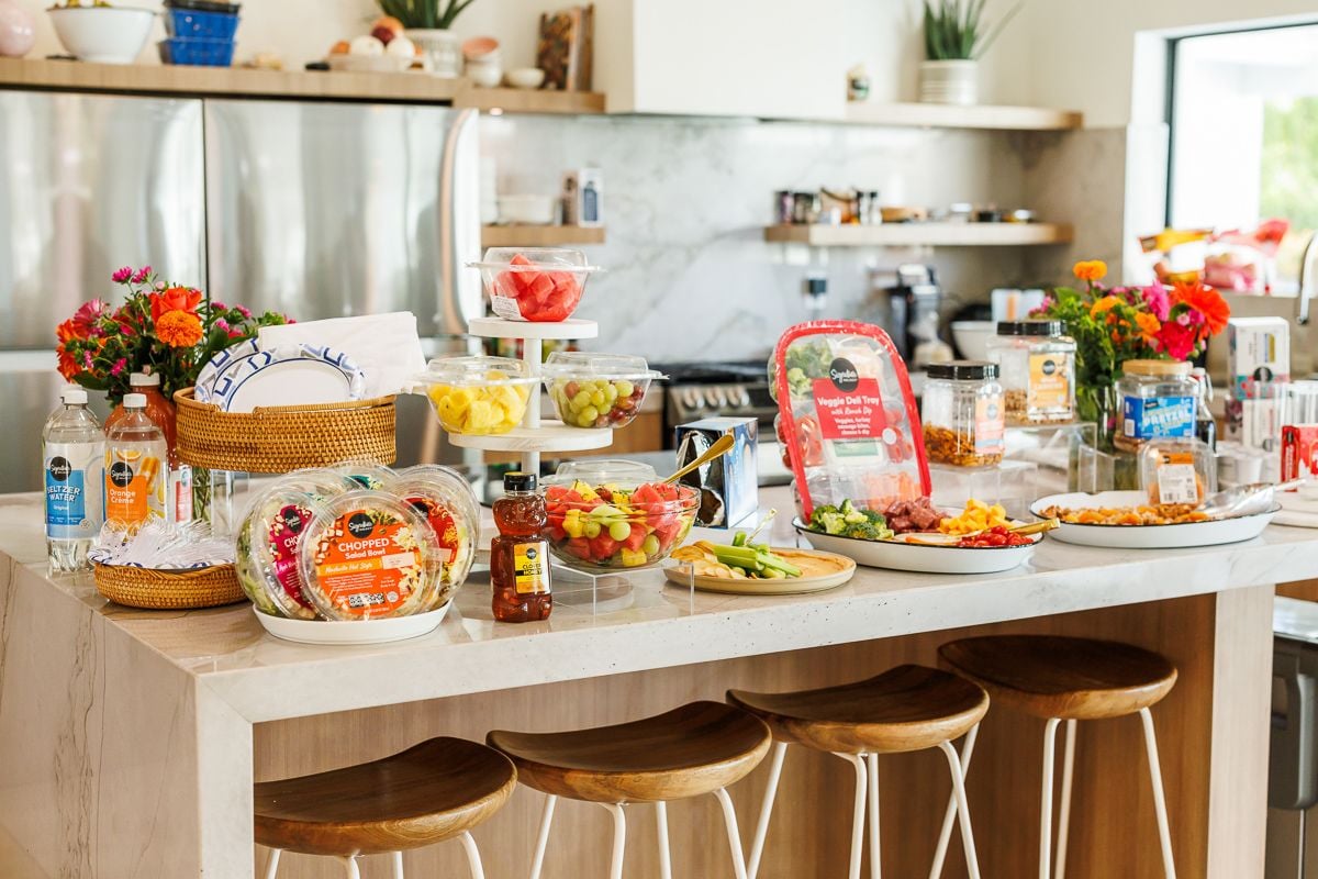 Brunch spread across an island hosted by Albertson's and Signature Select