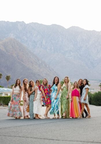 girls in palm springs in front of the mountains