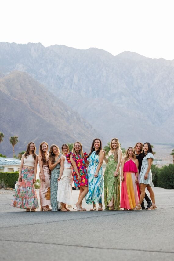 girls in palm springs in front of the mountains