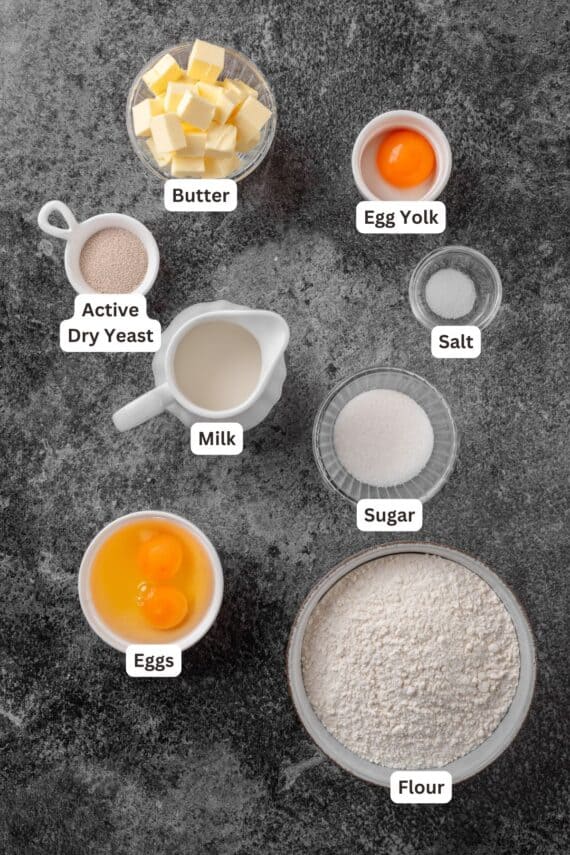 Babka dough ingredients with text labels overlaying each ingredient.