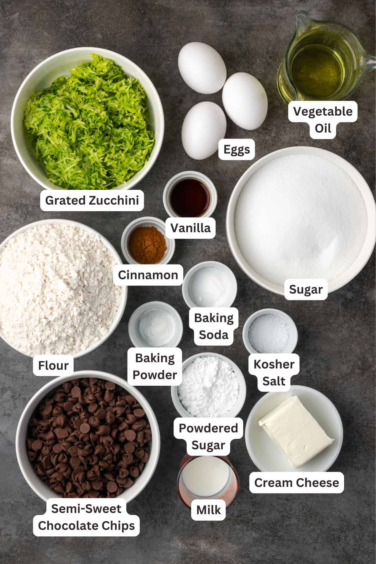 Chocolate chip zucchini bread ingredients with text labels overlaying each ingredient.