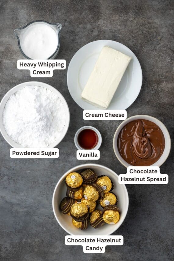 Chocolate hazelnut cake filling ingredients with text labels overlaying each ingredient.