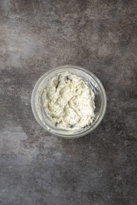 Make juicy, restaurant-quality air fryer filet mignon slathered with homemade garlic compound butter for the ultimate steak dinner! Garlic compound butter in a bowl.