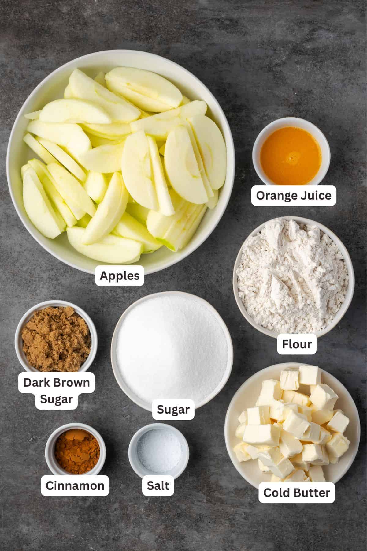 Apple brown betty ingredients with text labels overlaying each ingredient.