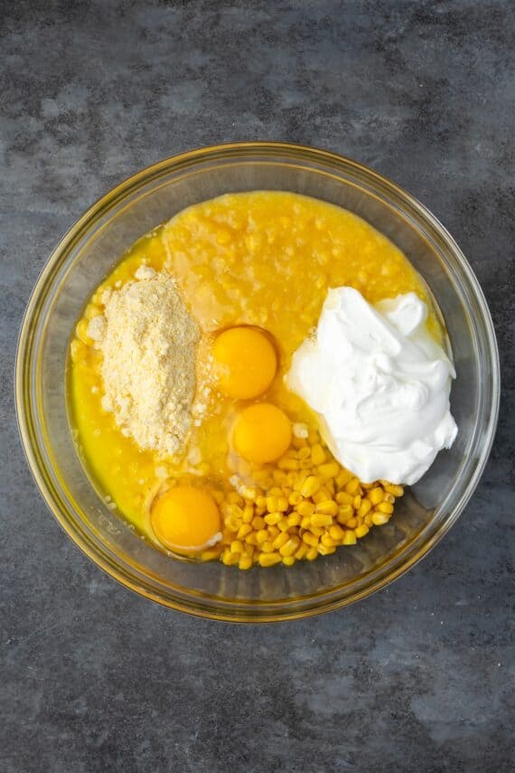 Spoon bread ingredients combined in a bowl.
