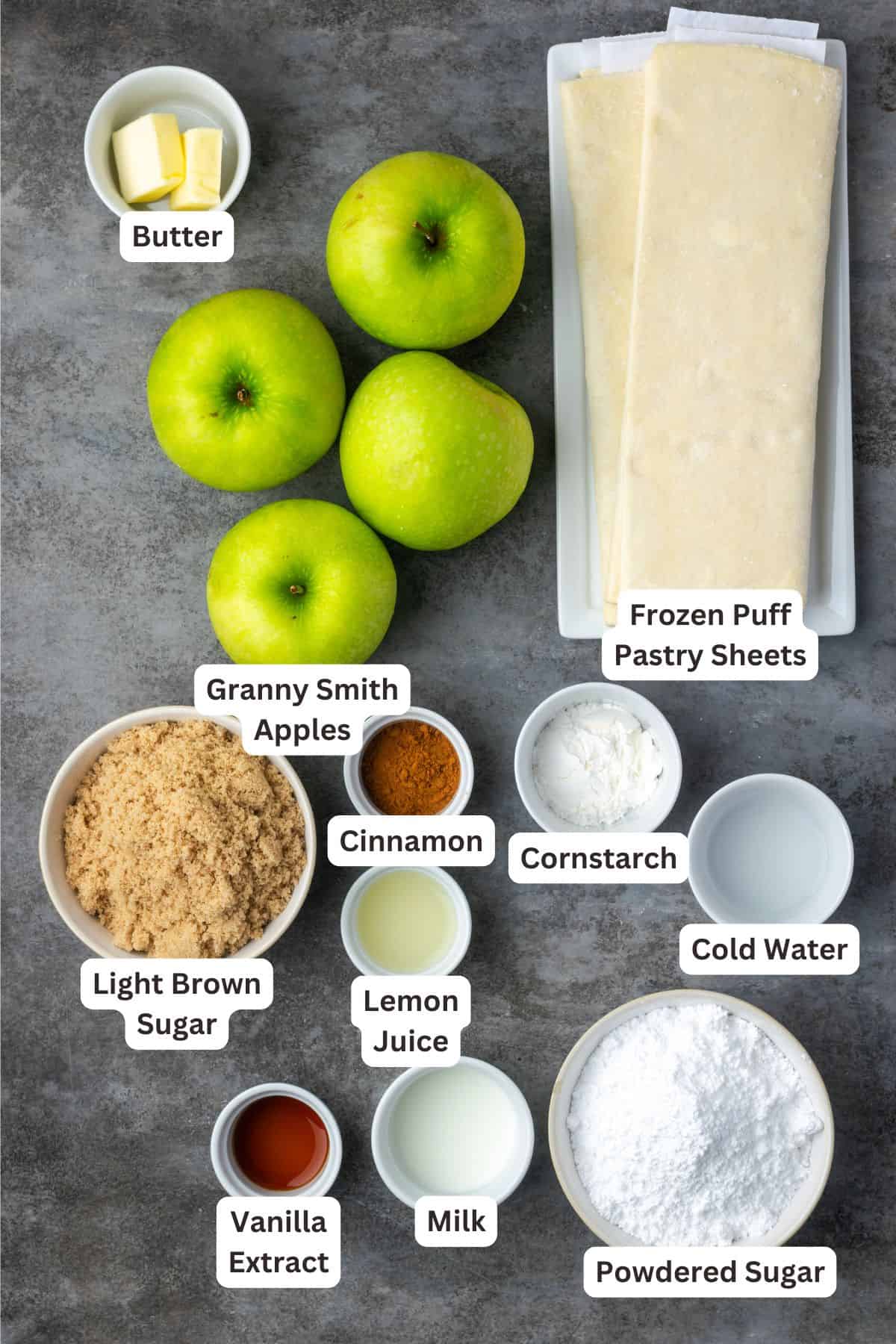 Crispy, buttery store-bought puff pastry and quick, homemade apple filling make these easy apple turnovers the perfect fall weekend treat! Apple turnover ingredients with text labels overlaying each ingredient.