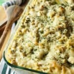 Freshly baked cheesy chicken tetrazzini in a glass casserole dish.