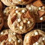 Stuffed homemade Biscoff cookies with white chocolate stacked.