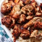 Chopped Chipotle chicken served next to rice on a plate.