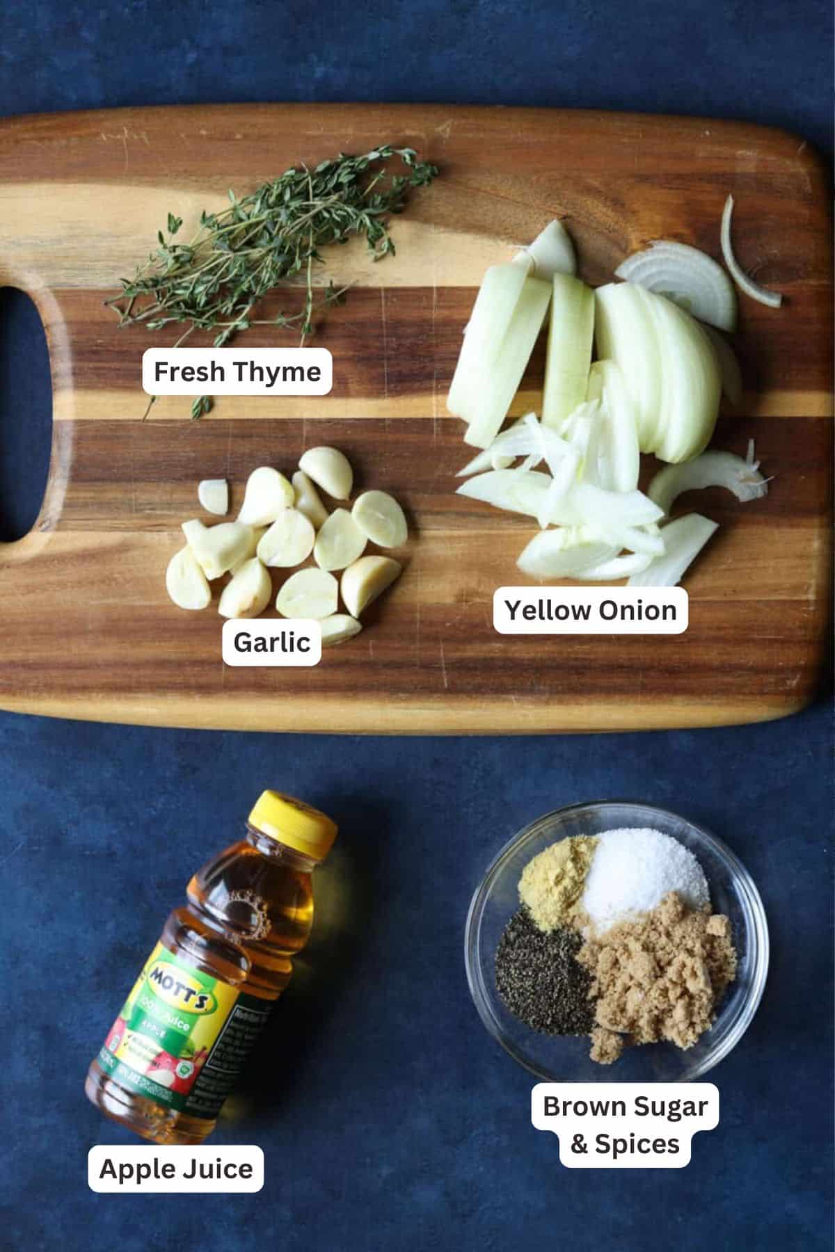 This crock pot pulled pork recipe makes the best sliders! Juicy pork shoulder is slow-cooked with apple marinade until it's fall-apart-tender. Ingredients for Crock Pot Pulled Pork Sliders.