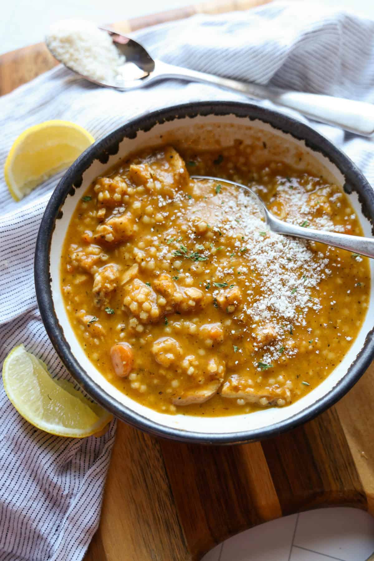 Discover how to make the easiest and most delicious Italian Pastina Soup that’s perfect for cozy nights, bursting with comforting flavors in every spoonful. Italian Pastina Soup in a bowl served with a spoon from above.