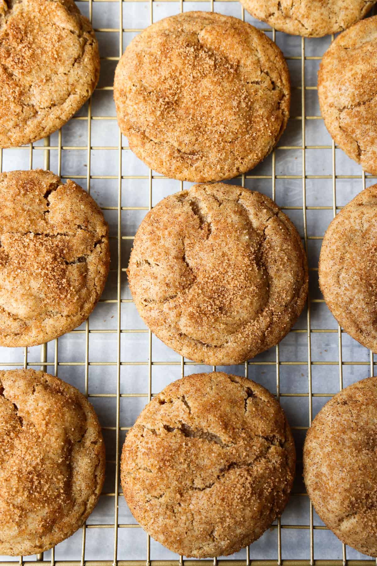 Churro cookies on a wire cooling rack from above.