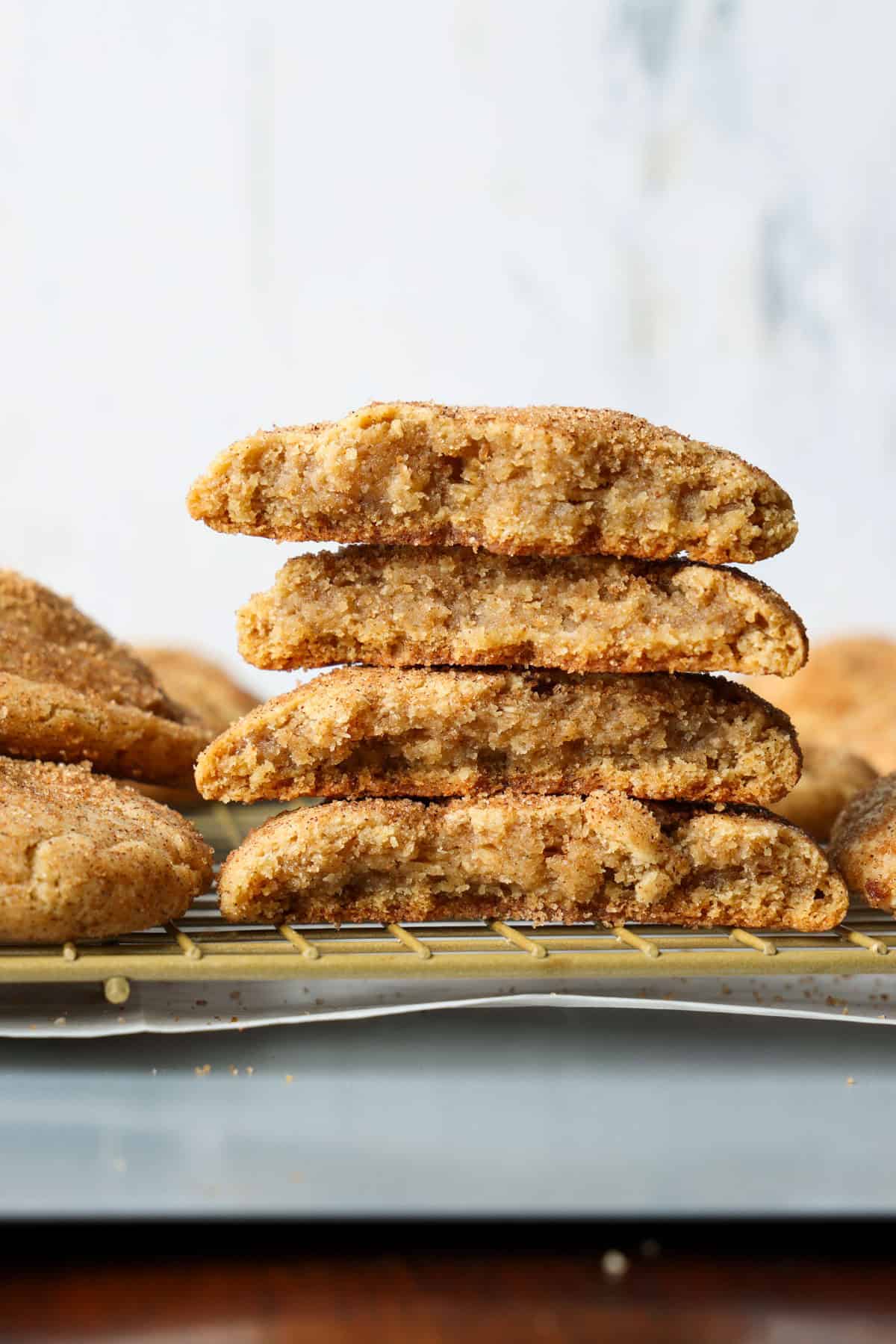 Churro cookies broken in half and stacked